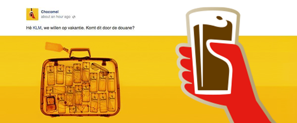 Post van Chocomel met een koffer die vol zit met chocomel.